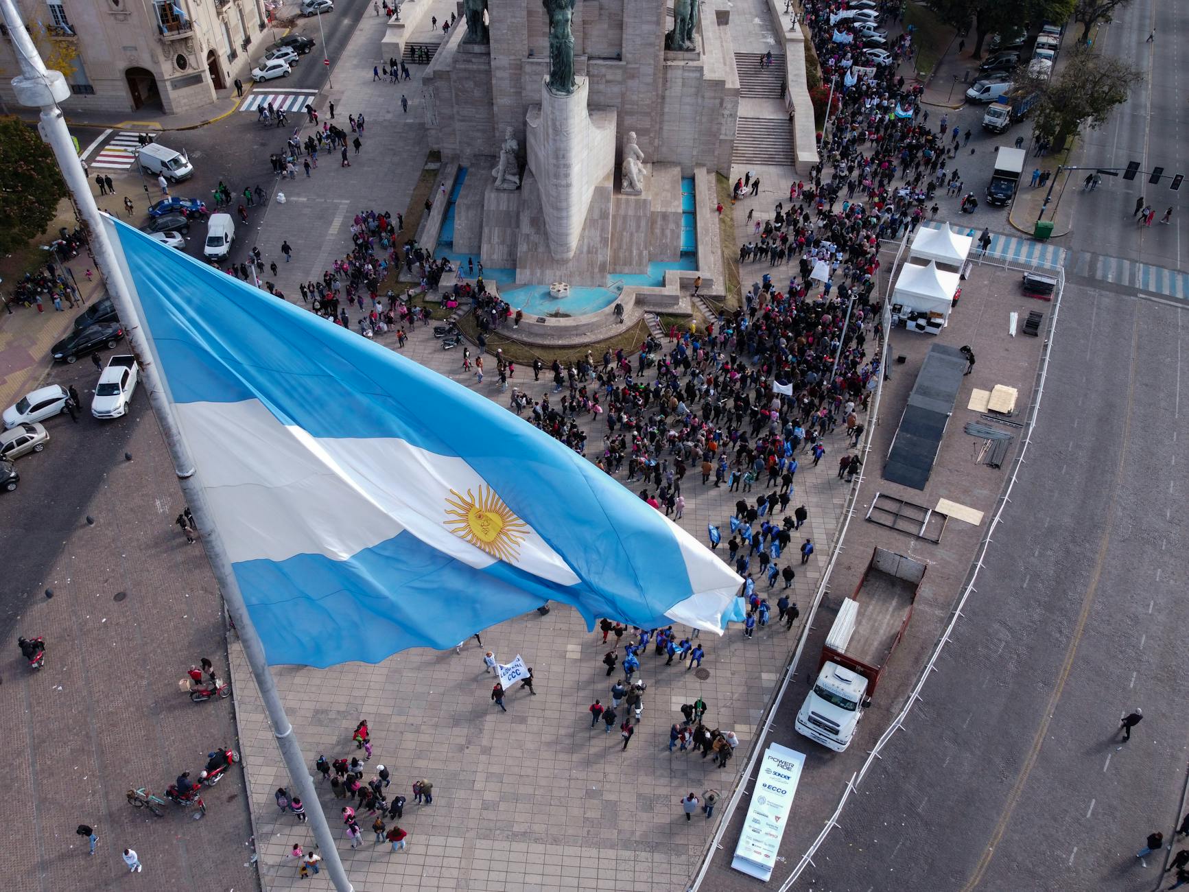 flag of argentina against rally in city